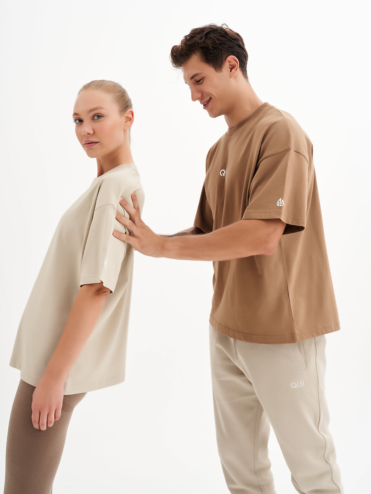 a man and a woman standing next to each other